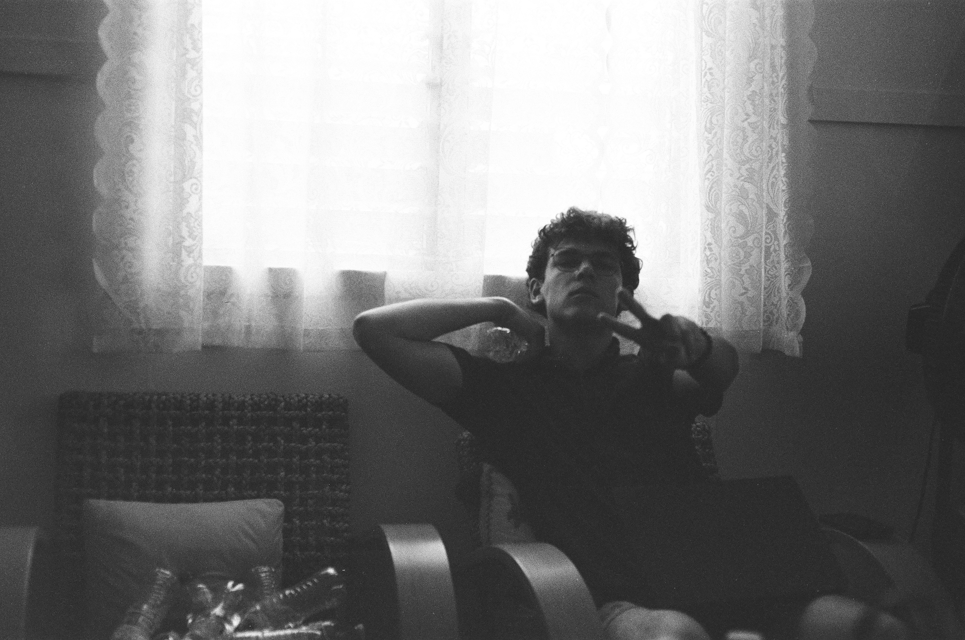 figure by window light